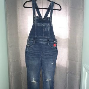 Medium wash overalls